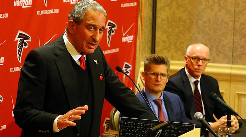 122914 ATLANTA: Falcons owner Arthur Blank (from left), GM Thomas Dimitroff and President Rich McKay take questions during a press conference following the firing of head coach Mike Smith at the Arthur M. Blank Foundation on Monday, Dec. 29, 2014, in Atlanta. Blank is leading the team's search for a replacement. Curtis Compton / ccompton@ajc.com FILE PHOTO: 122914 ATLANTA: Falcons owner Arthur Blank (from left), GM Thomas Dimitroff and President Rich McKay take questions during a press conference following the firing of head coach Mike Smith at the Arthur M. Blank Foundation on Monday, Dec. 29, 2014, in Atlanta. The team now knows how much it will cost to extend Julio Jones' contract. (Curtis Compton / ccompton@ajc.com)
