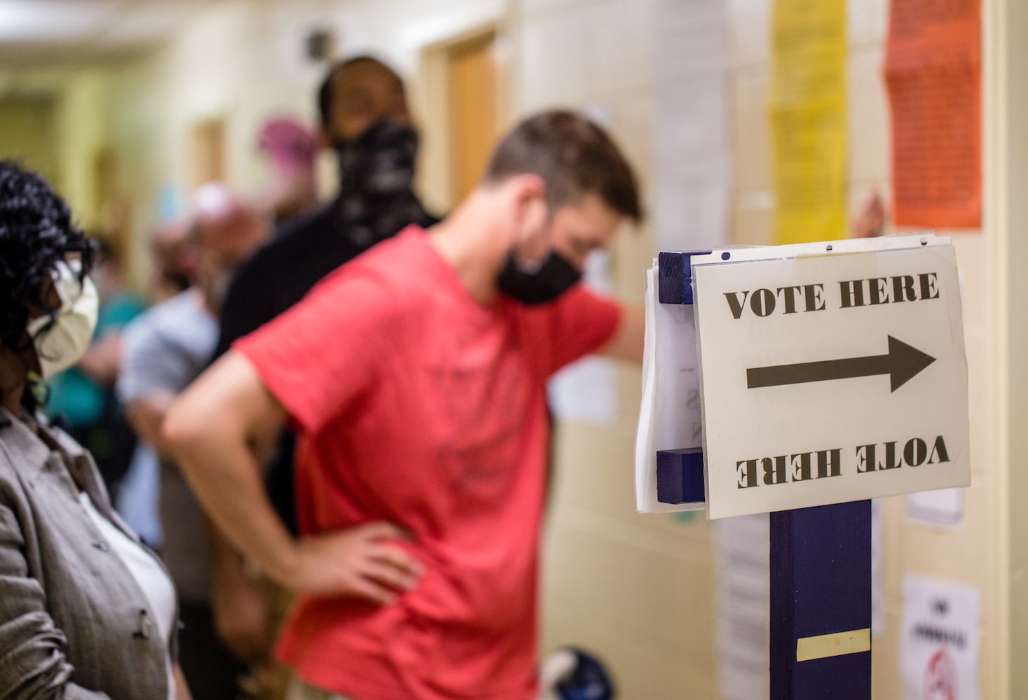 PHOTOS: Georgia voters struggle with long lines, new equipment, social distancing