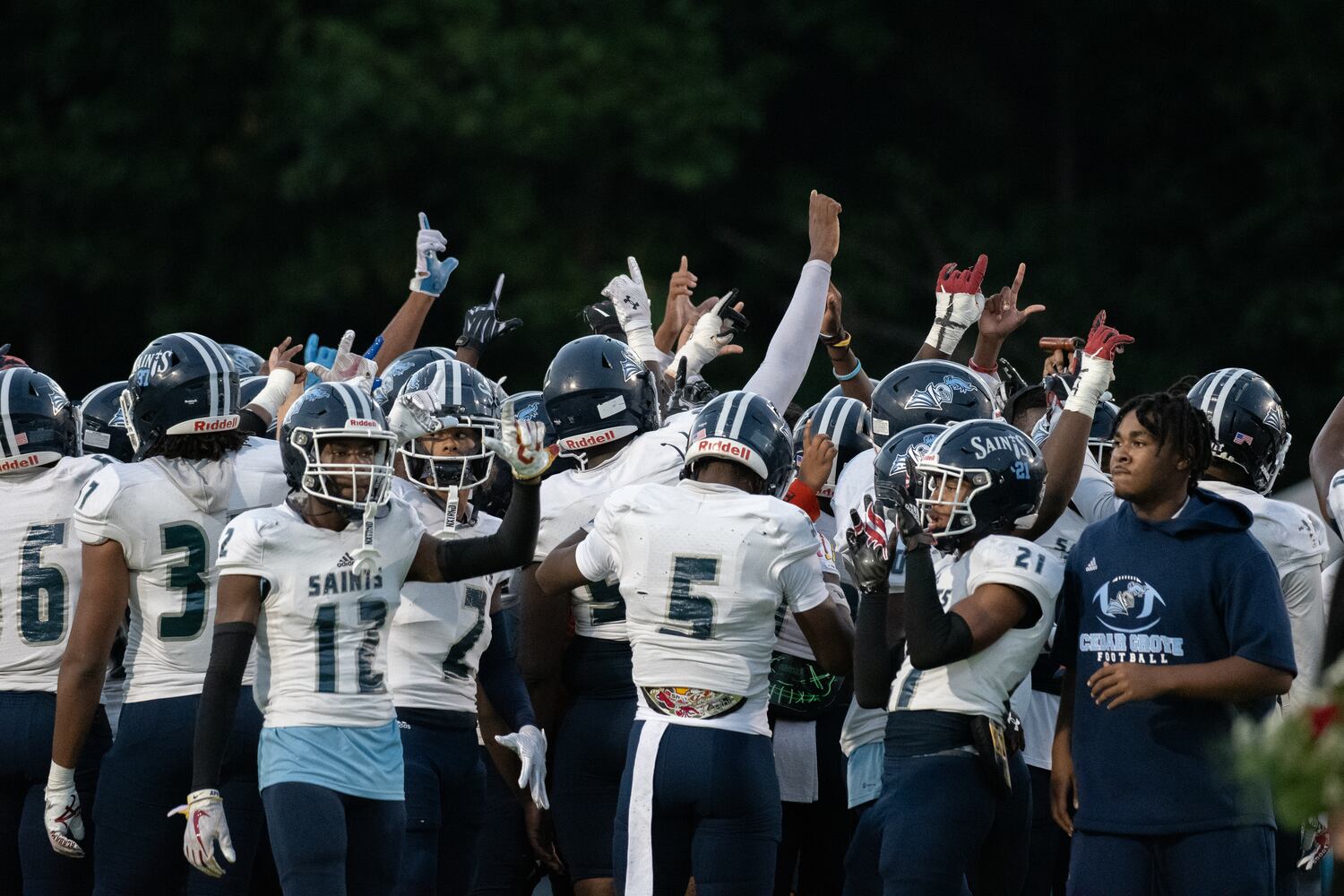 Cedar Grove Saints get excited for the Cedar Grove at Mill Creek HS football game, September 15, 2023. (Jamie Spaar for the Atlanta Jounal Constitution)