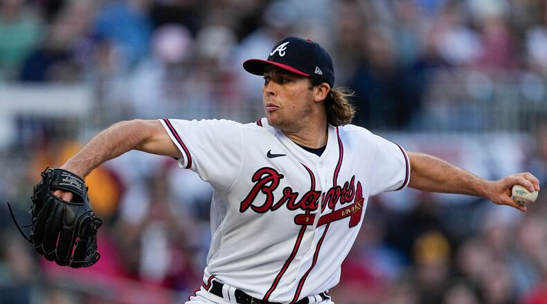 Atlanta Braves starting pitcher Dylan Dodd (46) throws in the first inning of a baseball game against the San Diego Padres, Sunday, April 9, 2023, in Atlanta. (AP Photo/John Bazemore)