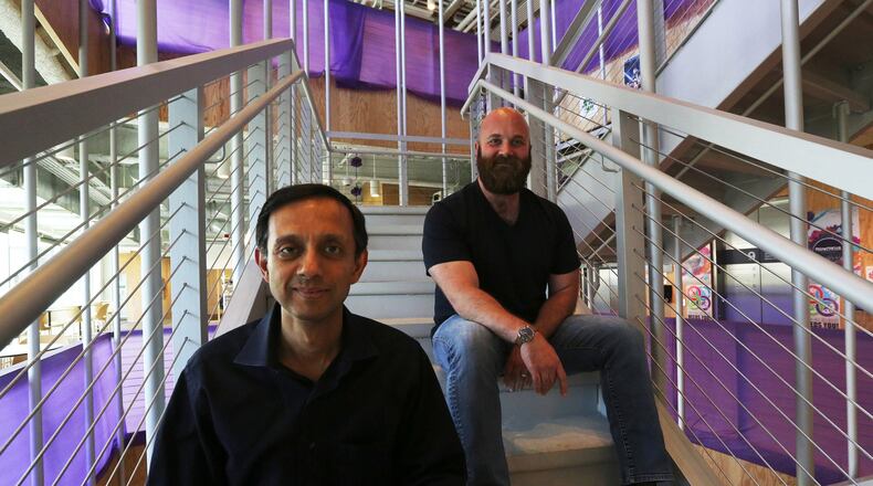 Surendra Verma, left, and J.R. Tipton are Facebook engineering managers in the company’s Seattle office. They are on the storage team charged with building the tools to store the billions of photos and videos uploaded to Facebook and Instagram. (Alan Berner/Seattle Times/TNS)