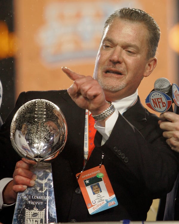 FILE - Indianapolis Colts owner Jim Irsay holds the Vince Lombardi Trophy after the Colts defeated the Chicago Bears 29-17 in the Super Bowl XLI football game at Dolphin Stadium in Miami, Sunday, Feb. 4, 2007. (AP Photo/David J. Phillip, File)