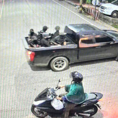 This image taken from video provided by Internal Security Operations Command Region 4 shows a group of the alleged attackers riding on a back of a black pickup truck before they opened fire and threw pipe bombs at soldiers at a security checkpoint in Narathiwat province, Thailand, Wednesday, July 22, 2026. (Internal Security Operations Command Region 4 via AP)