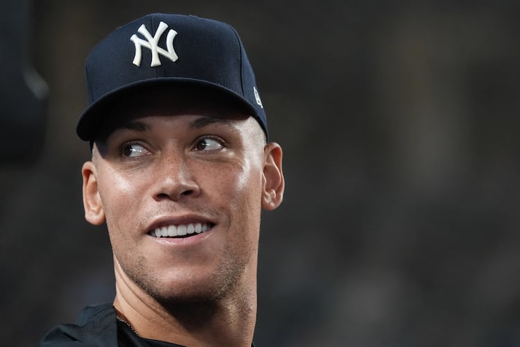 New York Yankees' Aaron Judge smiles towards fans during a baseball game against the Houston Astros, Wednesday, Aug. 26, 2026, in New York. (AP Photo/Ryan Murphy)