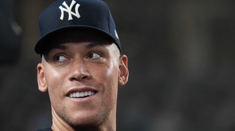New York Yankees' Aaron Judge smiles towards fans during a baseball game against the Houston Astros, Wednesday, Aug. 26, 2026, in New York. (AP Photo/Ryan Murphy)