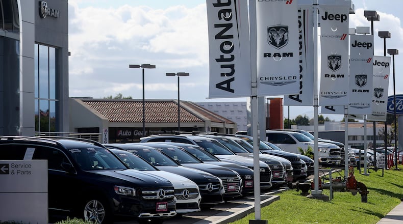Vehicles on sale at an AutoNation car dealership on April 21, 2022, in Valencia, California. (Mario Tama/Getty Images/TNS)