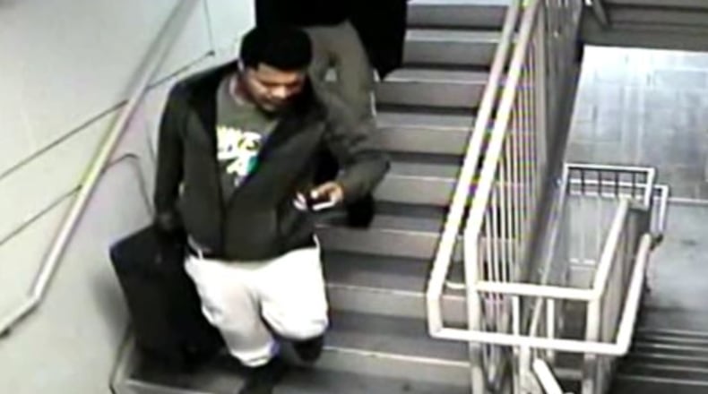 Surveillance video shows the people police said took high-end luggage with guns and cash inside from a residence atop the W hotel downtown.