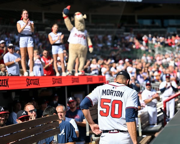 Charlie Morton makes a lap around the dugout after pitching his last game for the Braves on Sunday, Sept. 28, 2025, at Truist Park in Atlanta. (Daniel Varnado for the AJC)
