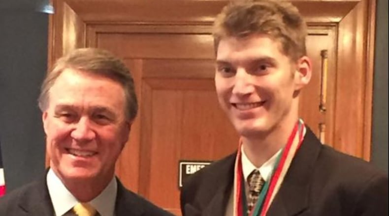 Sen. David Perdue (left) was one of the officials Michael Holland of Douglasville met with in Washington.