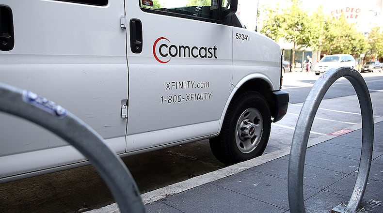 SAN FRANCISCO, CA - JULY 13: A Comcast service vehicle is seen parked on July 13, 2015 in San Francisco, California. Comcast announced plans to launch a streaming video service later this summer for Xfinity internet subscibers. The service called Stream will cost $15 a month. (Photo by Justin Sullivan/Getty Images)