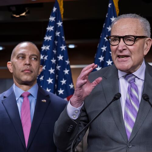 Senate Minority Leader Chuck Schumer, D-N.Y., center, speaks during a news conference as House Minority Leader Hakeem Jeffries, D-N.Y. listens, at the Capitol in Washington, Wednesday, Feb. 4, 2026. (AP Photo/J. Scott Applewhite)