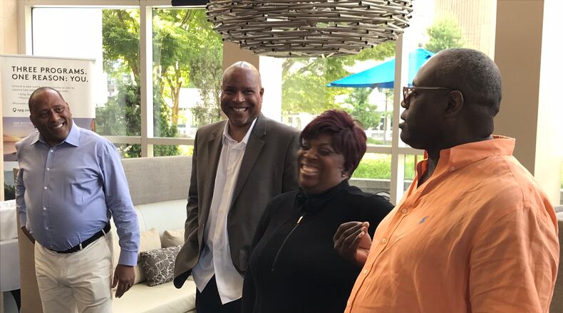 Frank Ski (left) with his boss Rick Caffey, his on-air partners Wanda Smith and Miss Sophia, at the Westin Buckhead for a party to celebrate his return to V-103 on July 2, 2018.