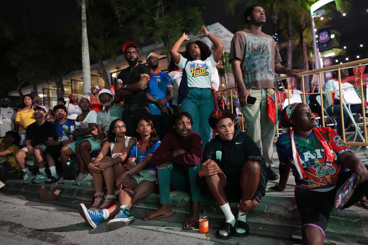 Haiti fans in Miami's Little Haiti neighborhood watch an outdoor broadcast of the country's World Cup match against Brazil on Friday, June 19, 2026. Brazil won 3-0. (Rebecca Blackwell/AP)