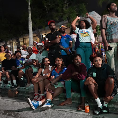 Haiti fans in Miami's Little Haiti neighborhood watch an outdoor broadcast of the country's World Cup match against Brazil on Friday, June 19, 2026. Brazil won 3-0. (Rebecca Blackwell/AP)