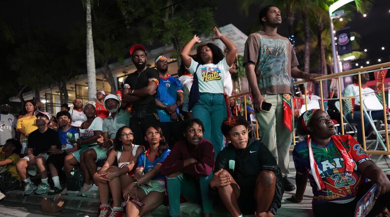 Haiti fans in Miami's Little Haiti neighborhood watch an outdoor broadcast of the country's World Cup match against Brazil on Friday, June 19, 2026. Brazil won 3-0. (Rebecca Blackwell/AP)