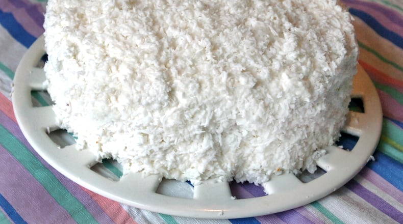 Many who remember Rich’s department store have a special place in their hearts for its Bakeshop’s coconut cake, which isn’t just delicious but also looks like a huge snowball. AJC File