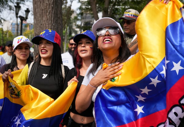 Venezuelans celebrate on Saturday, Jan. 3, 2026, in Lima, Peru, after U.S. President Donald Trump announced that President Nicolás Maduro had been captured and flown out of Venezuela. (Martin Mejia/AP)