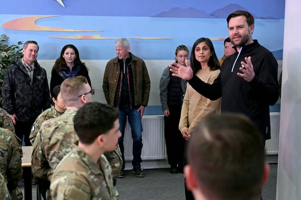 Vice President JD Vance, from right, and second lady Usha Vance, speak with soldiers at Pituffik Space Base in Greenland, Friday, March 28, 2025. (Jim Watson/Pool via AP)