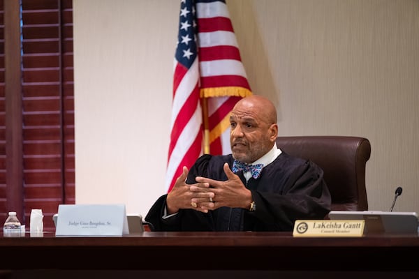 Retired Judge Gino Brogdon Sr. is the hearing officer for the Stockbridge City Council process that could lead to the mayor's removal from office. He spoke during a proceeding on Saturday, Aug. 22, 2026. (Ben Gray for the AJC)
