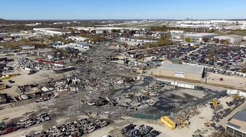 The scene of UPS fatal plane crash is shown from above on Thursday, Nov. 6, 2025, in Louisville, Ky. Fourteen people have been confirmed dead so far. (National Transportation Safety Board via AP)