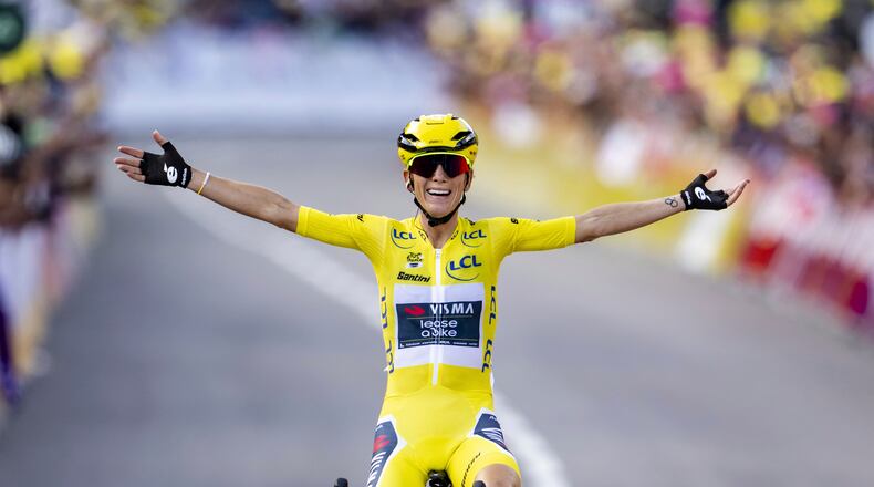 FILE - The winner of the Tour de France Femmes Pauline Ferrand-Prevot from France of team Visma - Lease a Bike celebrates as she crosses the finish line to win the 9th stage of the 4th edition of the Women's Tour de France cycling race in Chatel, France, Aug. 3, 2025. (Jean-Christophe Bott/Keystone via AP, File)