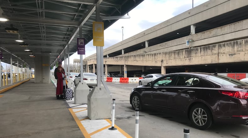 The new Hartsfield-Jackson domestic Terminal North pickup zone for Uber and Lyft opened Sunday, Dec. 23, 2018.