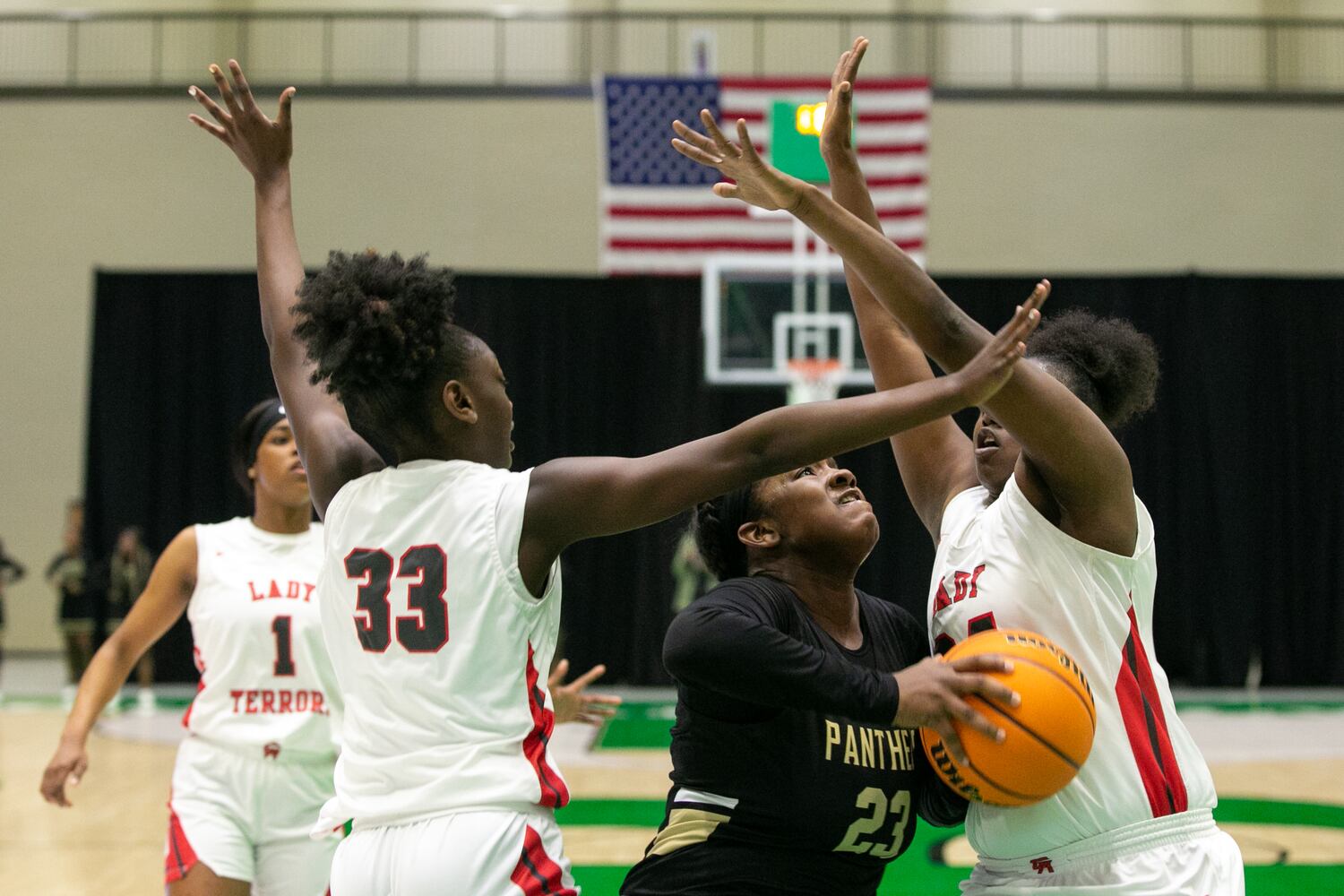 Photos: High school basketball state tourney continues