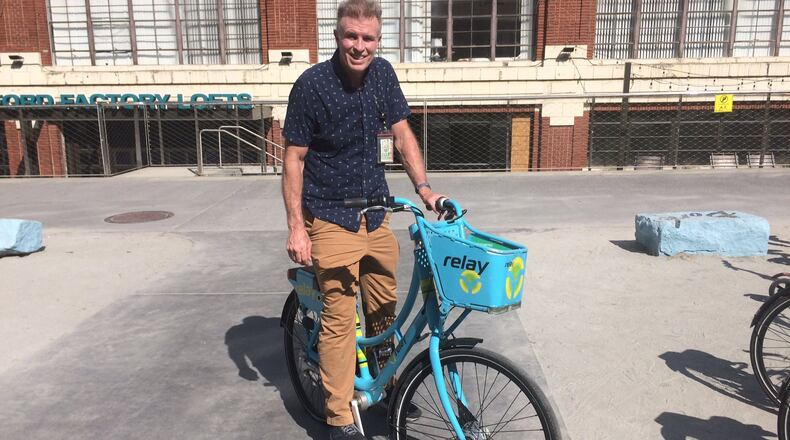 Bill Torpy on one of Atlanta’s Relay shareable bikes. He said he couldn’t find a Relay rider to interview, so he did the next best thing. Photo by David Flanigan