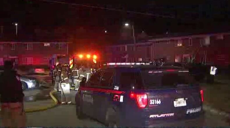 A mother and her 7-year-old and 4-month-old sons were trapped inside their apartment when fire crews arrived on the scene of a blaze at the Pavillion Place Apartments on Cleveland Avenue.