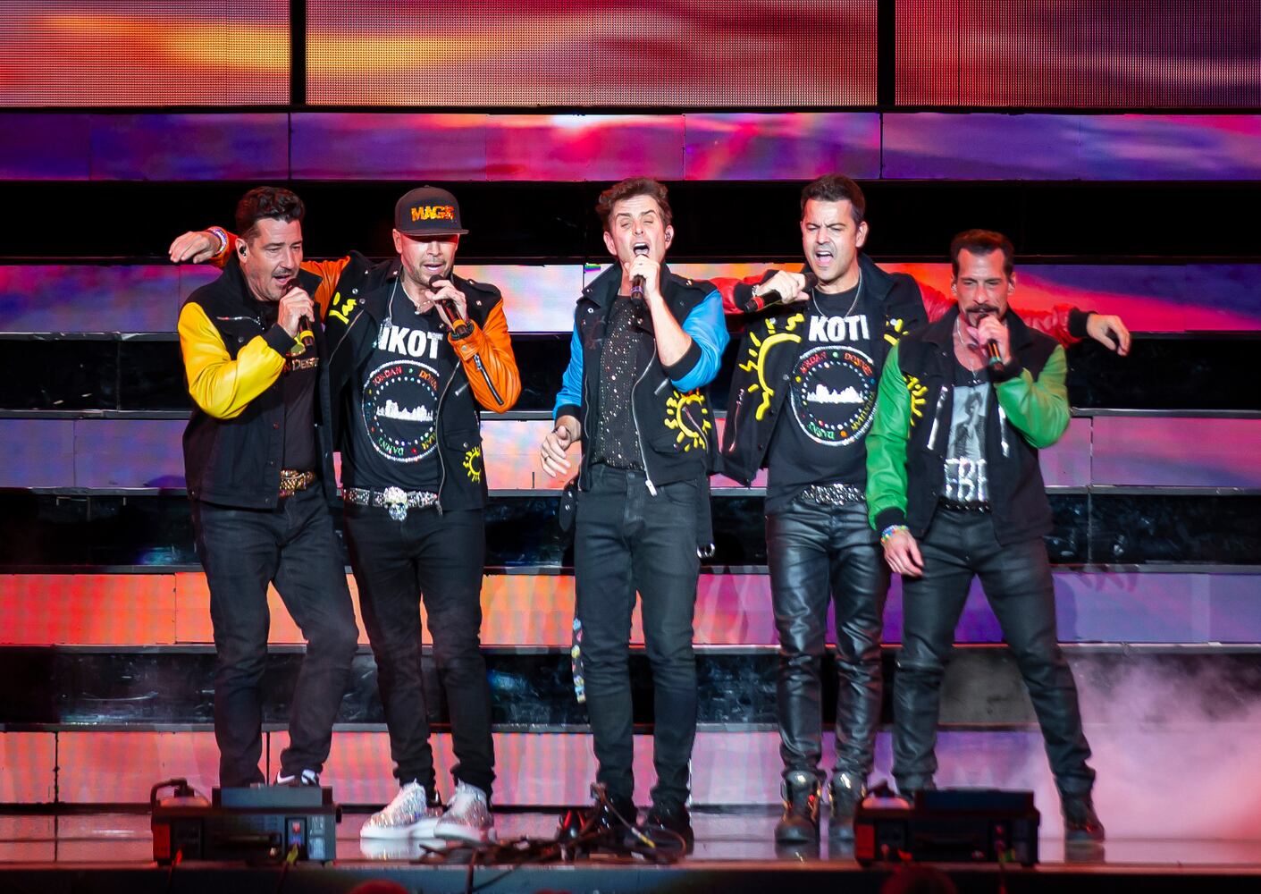 New Kids on the Block cranked out the hits to a packed house of neon clad fans at Ameris Bank Amphitheatre in Alpharetta on Friday, July 26, 2024. (RYAN FLEISHER FOR THE ATLANTA JOURNAL-CONSTITUTION)