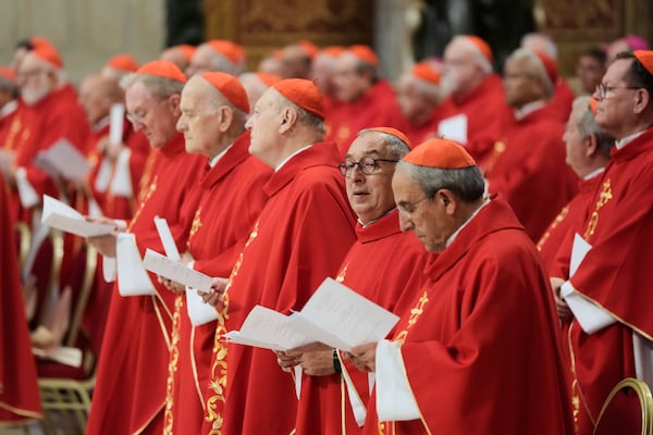 Cardinals nattend a mass on the sixth of nine days of mourning for late Pope Francis, in St. Peter's Basilica at the Vatican, Thursday, May 1, 2025. (AP Photo/Gregorio Borgia)