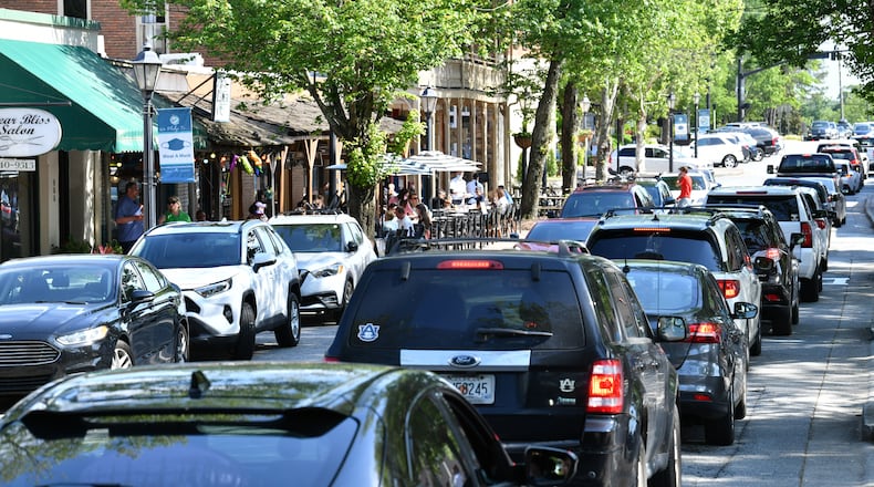 The group learned that economic impact and in-depth traffic studies that could determine how the district would be affected, have not been done, according to staff administrators. (Hyosub Shin / Hyosub.Shin@ajc.com)