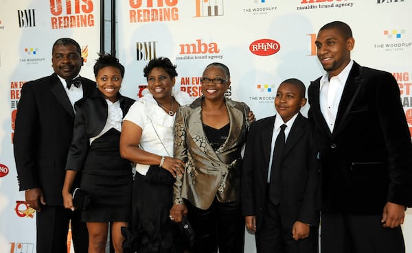 Karla Redding Andrews (third from left), daughter of Otis Redding, and Zelma Redding, (fourth from left), widow, pose with other family members during the red carpet event before "An Evening of Respect: A Musical Tribute to the Immortal Otis Redding" awards event at the Woodruff Arts Center in Atlanta. (Hyosub Shin/AJC 2009)