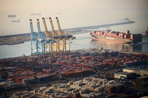 FILE - A cargo ship full of containers leaves the cargo terminal at the port of Barcelona, Spain, April 8, 2025. (AP Photo/Emilio Morenatti, File)