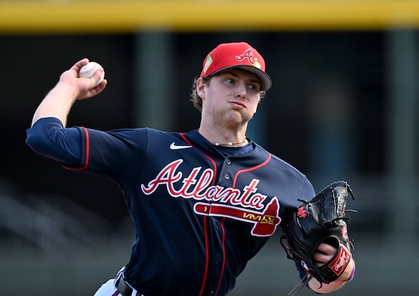 Braves pitcher JR Ritchie throws during a live batting practice session in February.