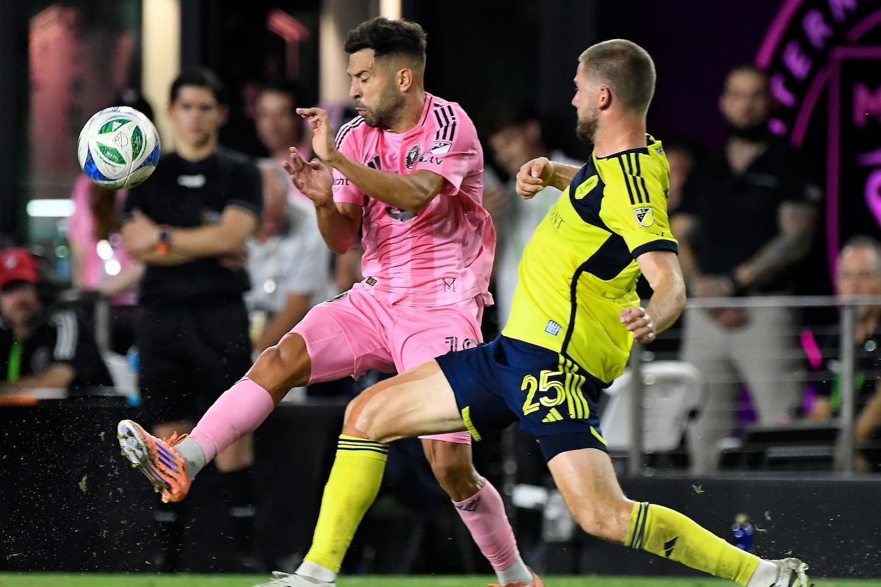 Nashville defender Walker Zimmerman (right) — pictured challenging Inter Miami's Jordi Alba during the MLS playoffs last month — seem like he would be a good fit with Atlanta United, but his salary is likely too high. (Michael Laughlin/AP)