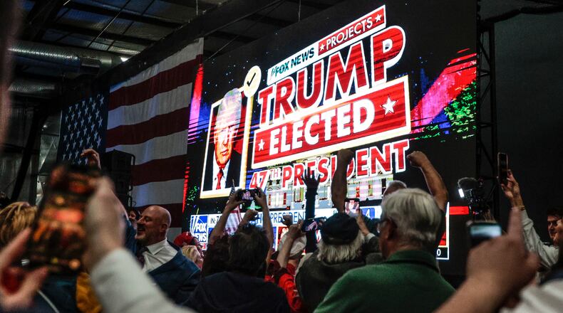 Supporters of Donald Trump celebrate after Fox News called the race for him at a Newtown watch party on Wednesday, Nov. 6, 2024. (Steven M. Falk/The Philadelphia Inquirer/TNS)
