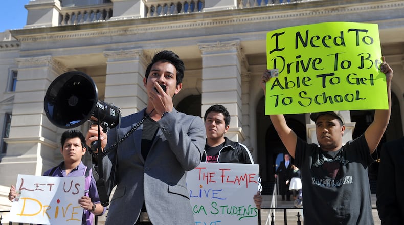 Eduardo Samniego speaks against Senate Bill 404 during a protest outside the state Capitol Monday February 24, 2014. The Bill would block Georgia driver licenses for immigrants who don't have legal status in the U.S. but who the government is temporarily allowing to stay and work here for humanitarian reasons. Proponents say the measure would help curb illegal immigration in Georgia.