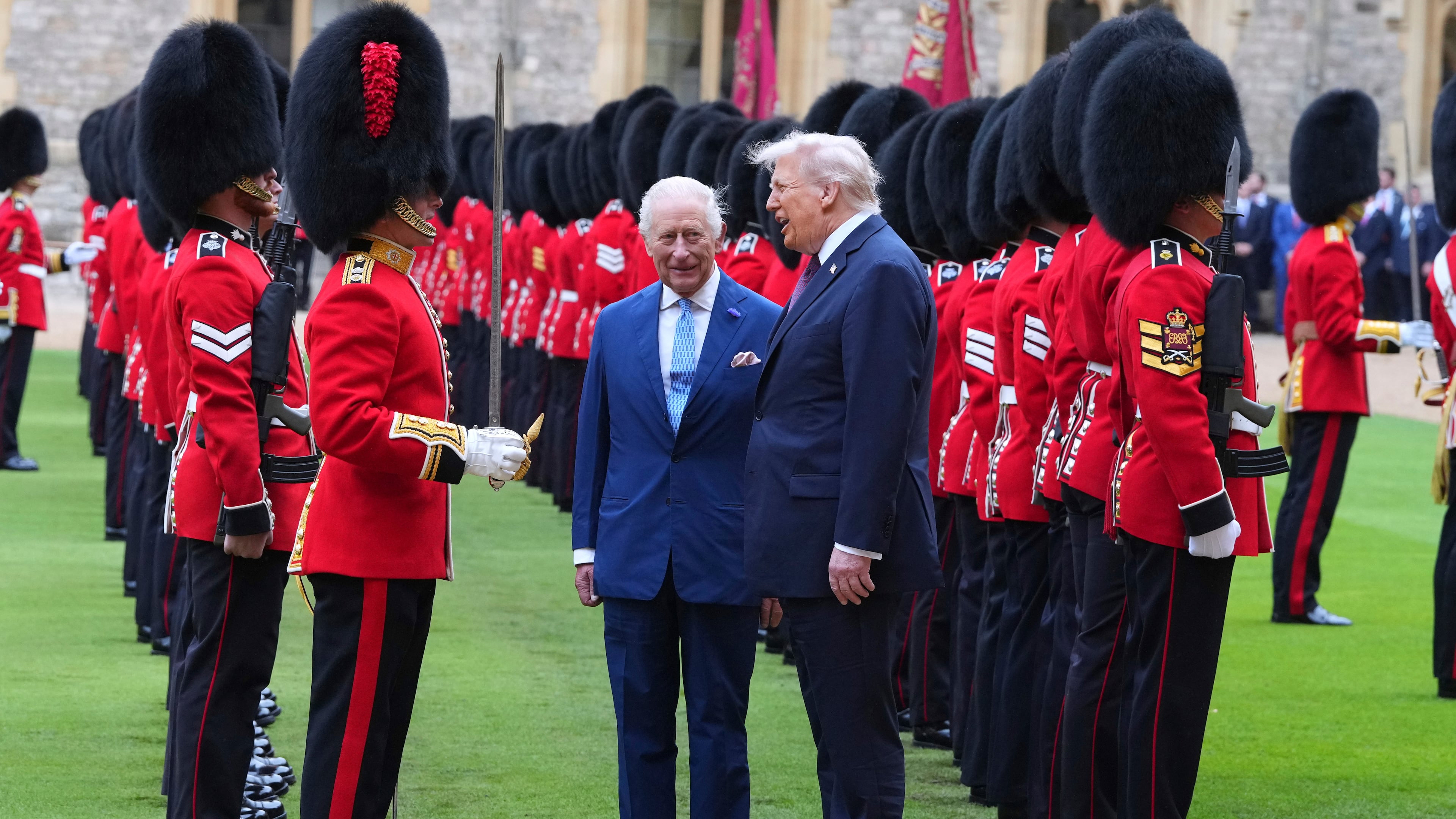 President Donald Trump and Britain's King Charles III review the Guard of Honour after the arrival at Windsor Castle in Windsor, England, Wednesday, Sept. 17, 2025.(AP Photo/Kirsty Wigglesworth, Pool)