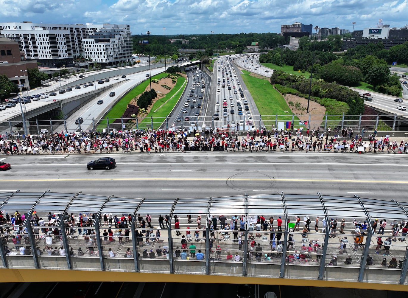 Protesters flood downtown Atlanta to oppose Trump, immigration policies