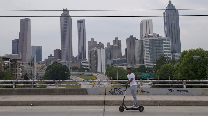 After a summer packed with residents’ cries for safer streets, Atlanta has accepted a $10,000 grant to improve the Jackson Street Bridge to make it safer for bicyclists, pedestrians, and electric scooter riders. ALYSSA POINTER/ATLANTA JOURNAL-CONSTITUTION