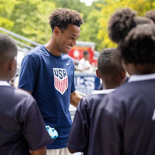 U.S. men's national team player Tyler Adams (center) participates in the unveiling of a minipitch at Sandtown Park in South Fulton on Tuesday, July 21, 2026. (Courtesy of Jenn Finch/Rank Studios)