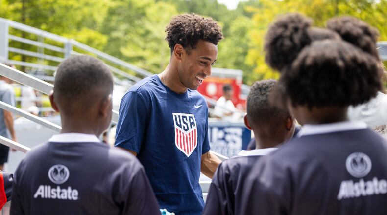 U.S. men's national team player Tyler Adams (center) participates in the unveiling of a minipitch at Sandtown Park in South Fulton on Tuesday, July 21, 2026. (Courtesy of Jenn Finch/Rank Studios)