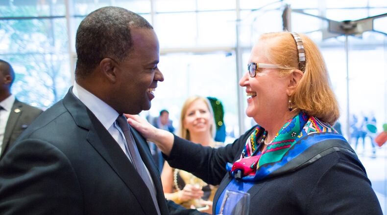 Virginia Hepner speaks to Atlanta Mayor Kasim Reed at a ceremony earlier this month announcing the completion of the Transformation fund-drive. The campaign was aided by a $1 million gift from the city of Atlanta. Photo: Woodruff Arts Center