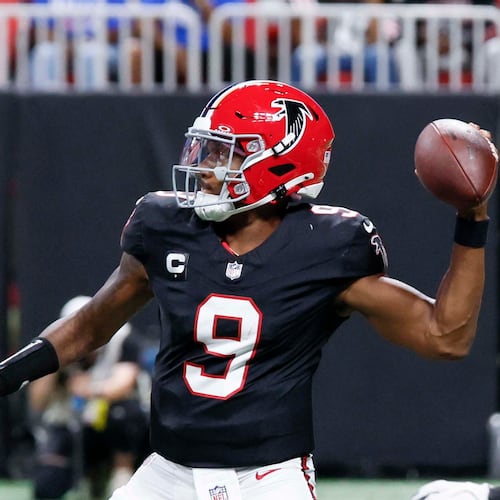 Atlanta Falcons quarterback Michael Penix Jr. throws a pass during the second half of an NFL game against the Buffalo Bills at Mercedes-Benz Stadium in Atlanta on Monday, Oct. 13, 2025. (Miguel Martinez/AJC)
