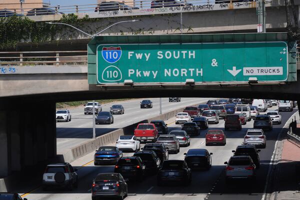 Traffic makes its way along the 110 freeway Thursday, May 22, 2025, in Los Angeles. (AP Photo/Jae C. Hong)