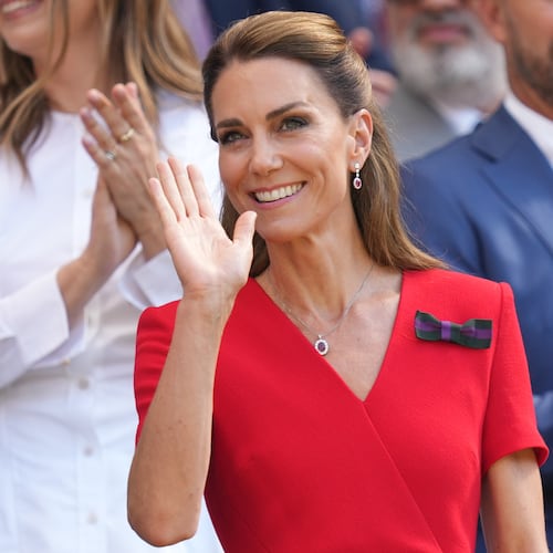 Britain's Princess Kate waves from the royal box on day 13 of the Wimbledon Tennis Championships in London, Saturday, July 11, 2026. (AP Photo/Kirsty Wigglesworth)