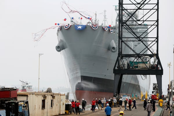FILE - The U.S. Navy launches the USNS Harvey Milk, a fleet replenishment oiler ship named after the first openly gay elected official, in San Diego, Saturday, Nov. 6, 2021. (AP Photo/Alex Gallardo, File)