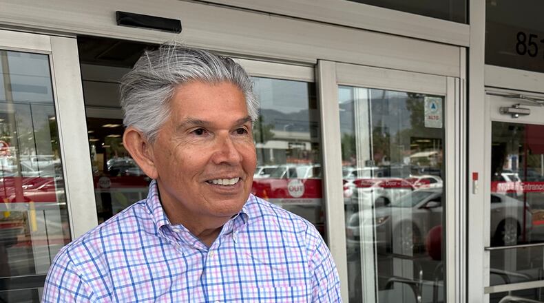 FILE - Republican gubernatorial candidate Duke Rodriguez talks with a voter in Albuquerque, N.M., Tuesday, June 2, 2026. (AP Photo/Susan Montoya Bryan, File)