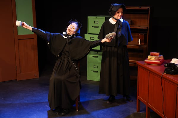 Madeleine Ross (left) plays Sister James, a young nun caught between Father Flynn and her superior, Sister Aloysius — played by Eileen Land (right) — in “Doubt: A Parable." (Abbey Cutrer/AJC)